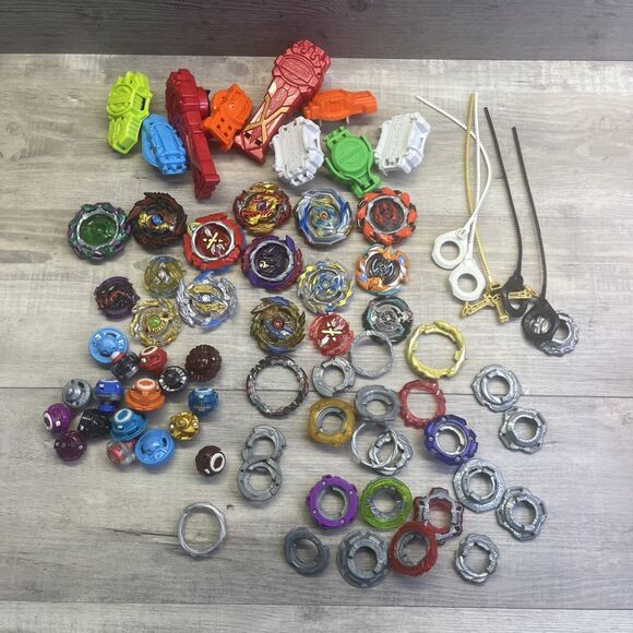 Assorted Large Lot of Beyblade Bay Blades Launchers Parts Metal & Plastic - Picture 13 of 14